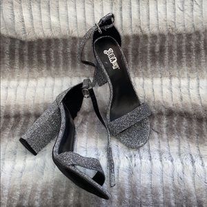 silver and black high heels